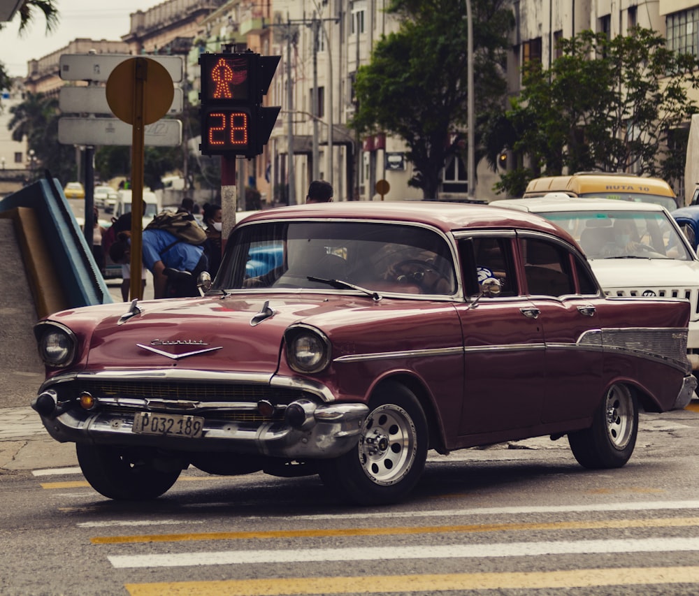 black classic car on road during daytime