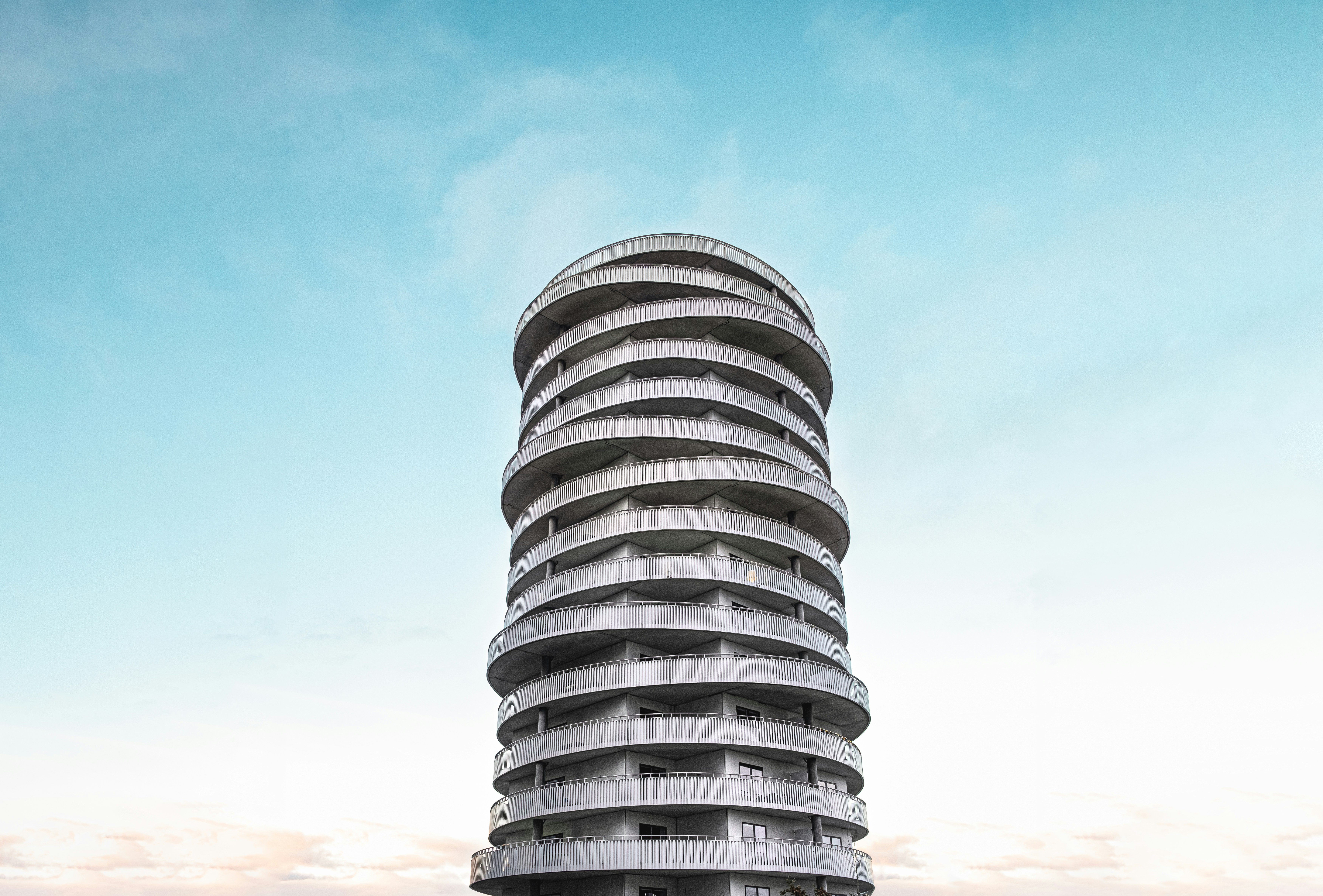 white concrete building under blue sky during daytime