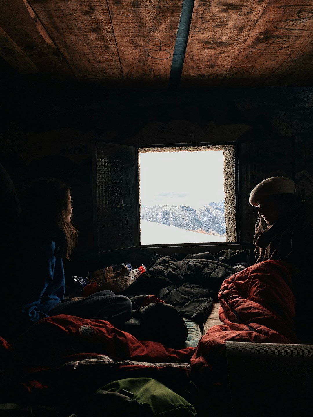 people sitting on chair inside room