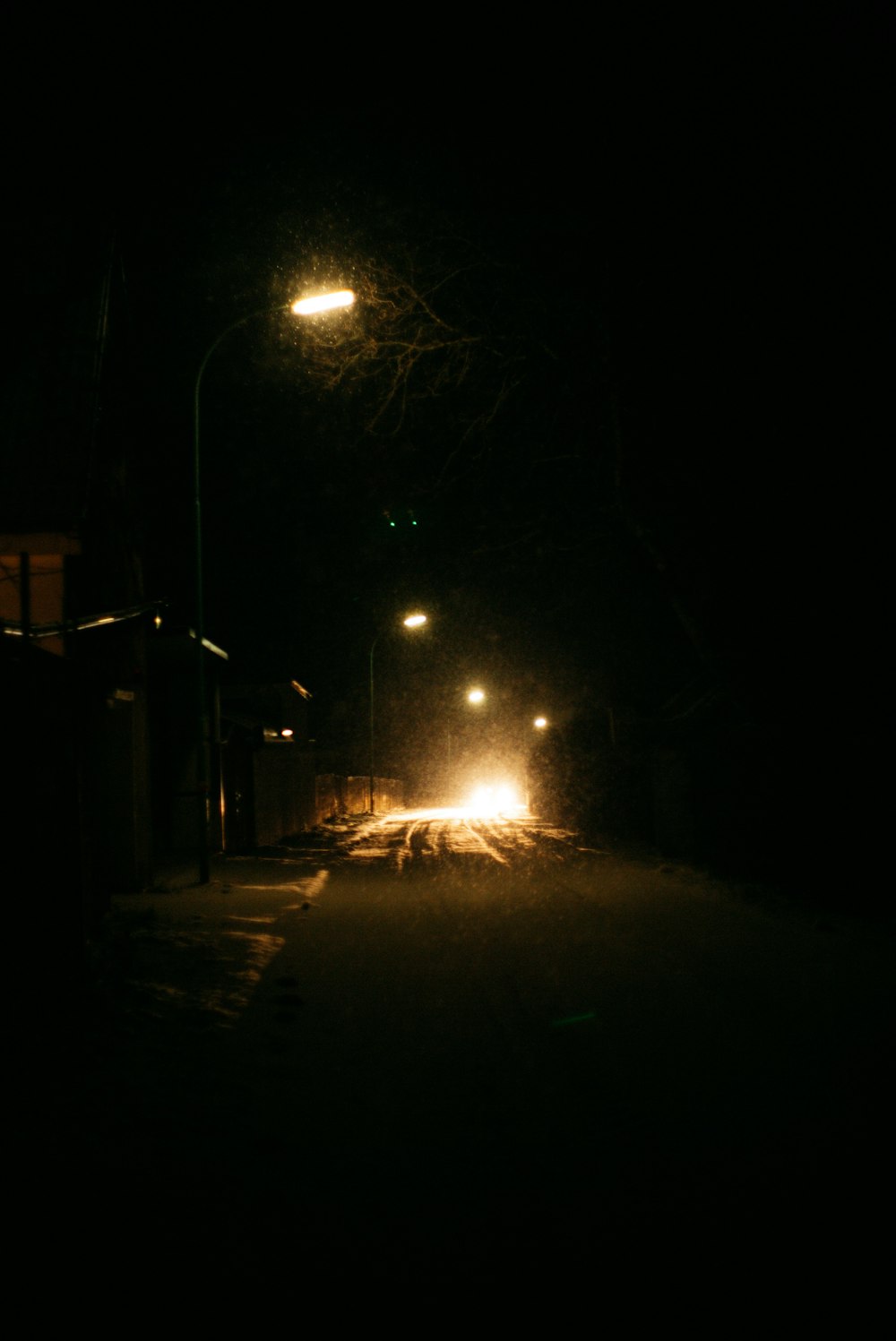 lighted street lamp during night time