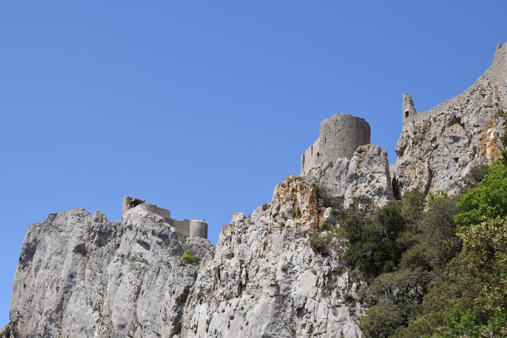 gray rock formation under blue sky during daytime