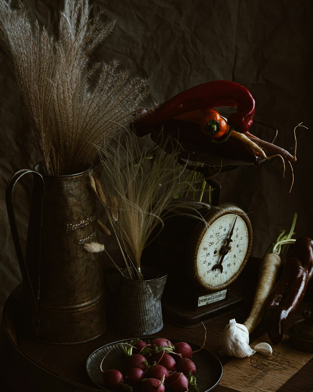 red rose beside brown ceramic mug with analog clock