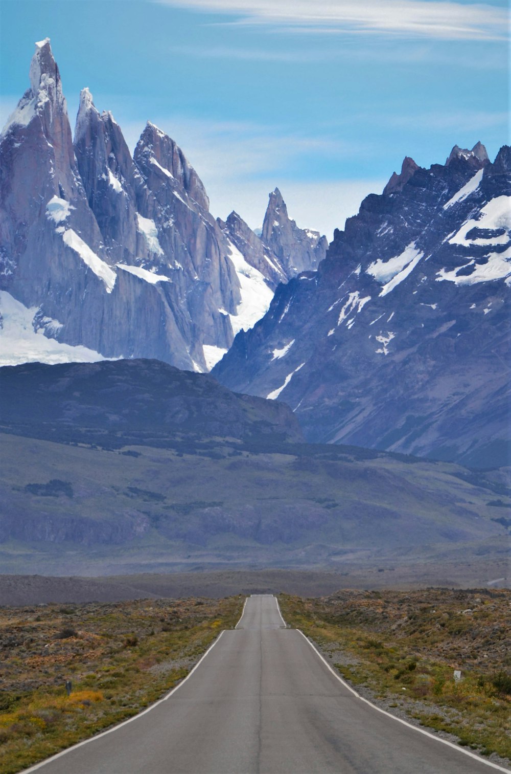 gray and white mountains under white sky during daytime