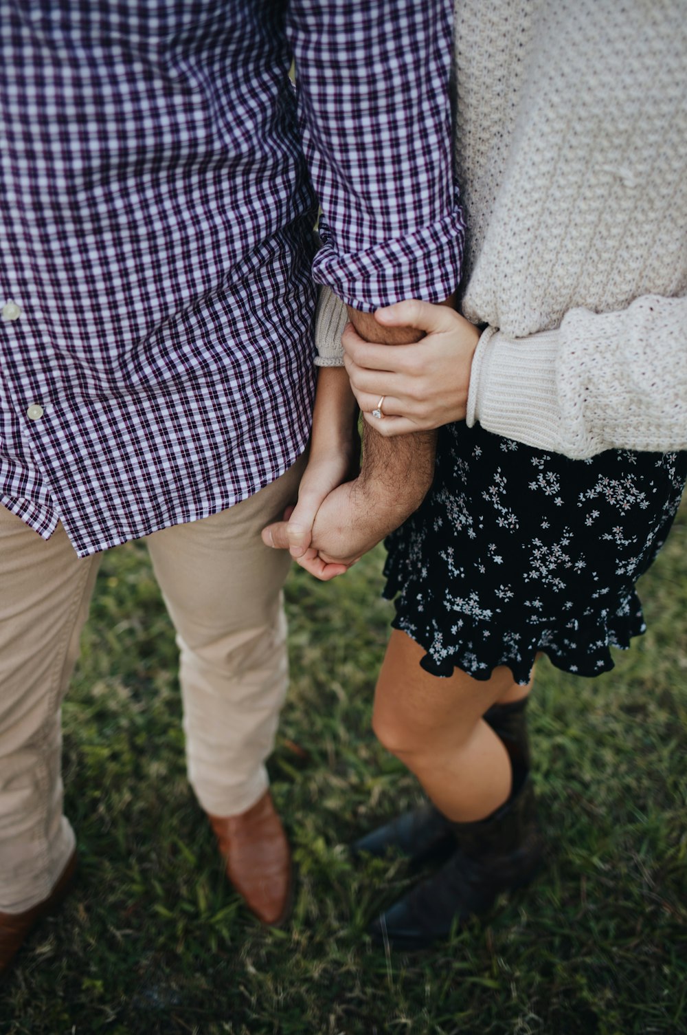 man and woman holding hands