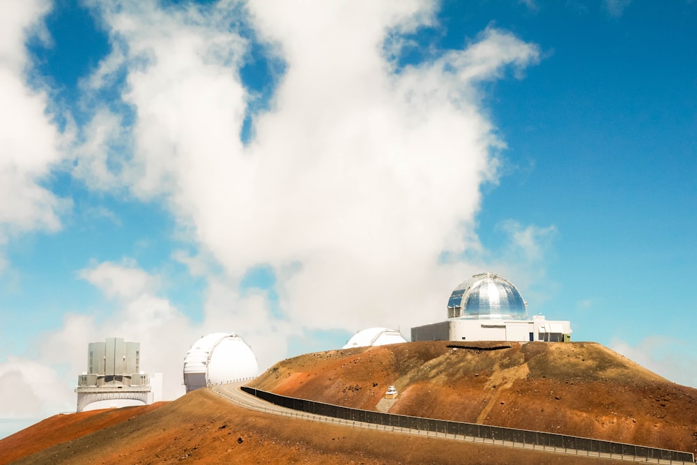 white dome building under white clouds during daytime