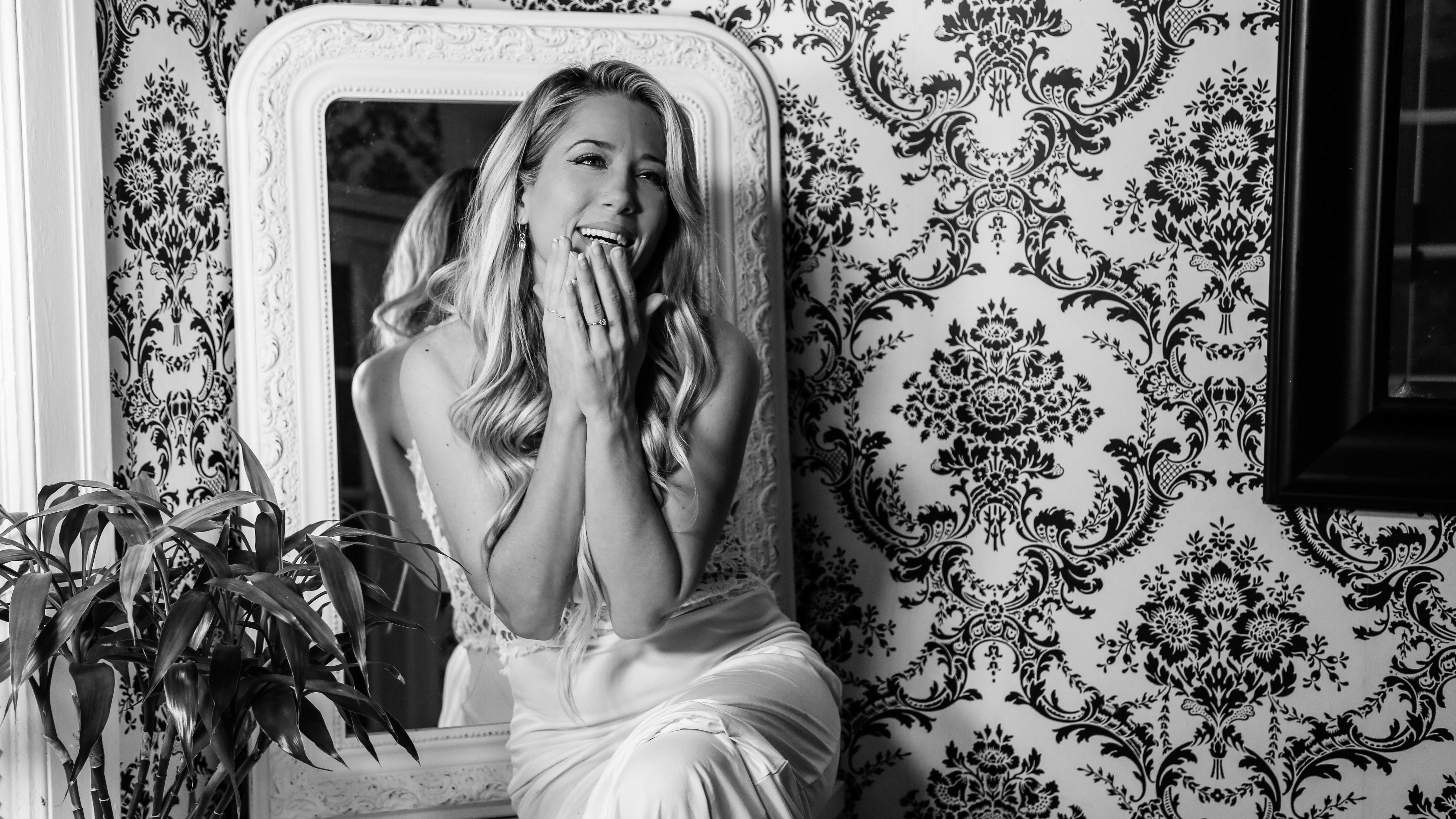 woman in white dress sitting on chair