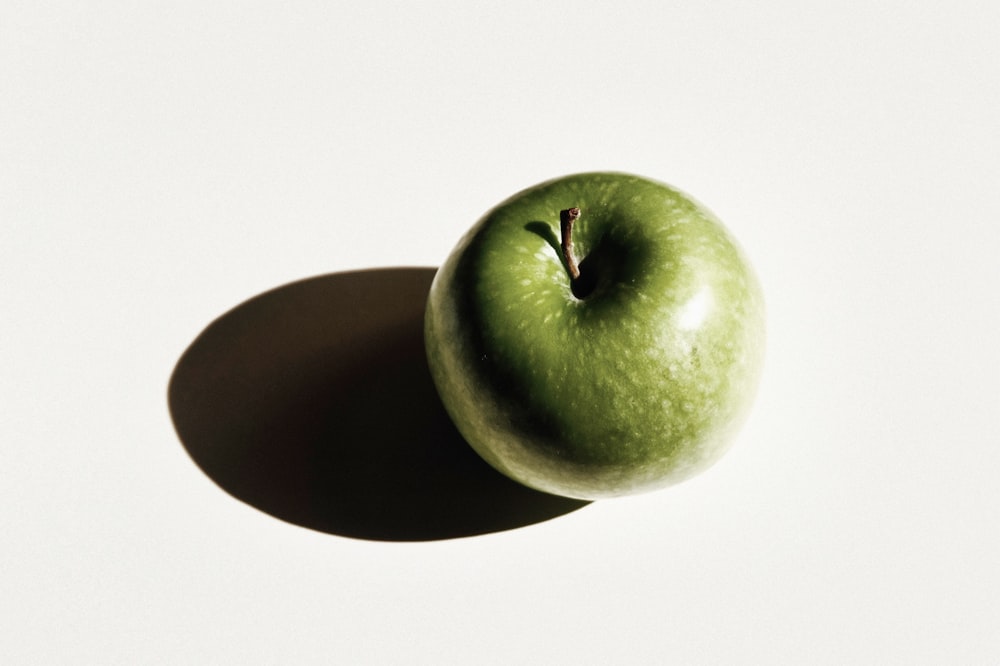 green apple on white background