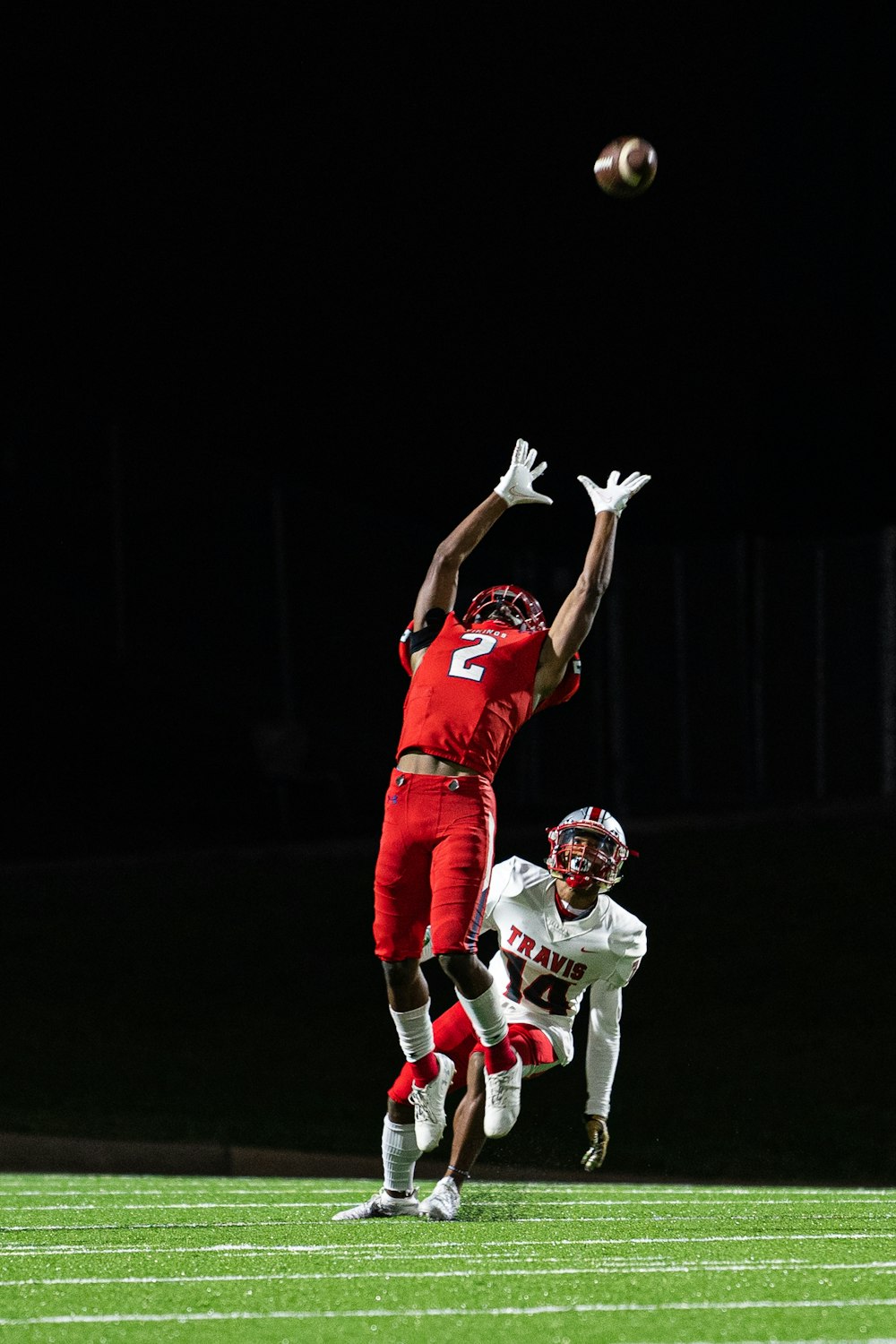 2 men in red jersey shirt and shorts