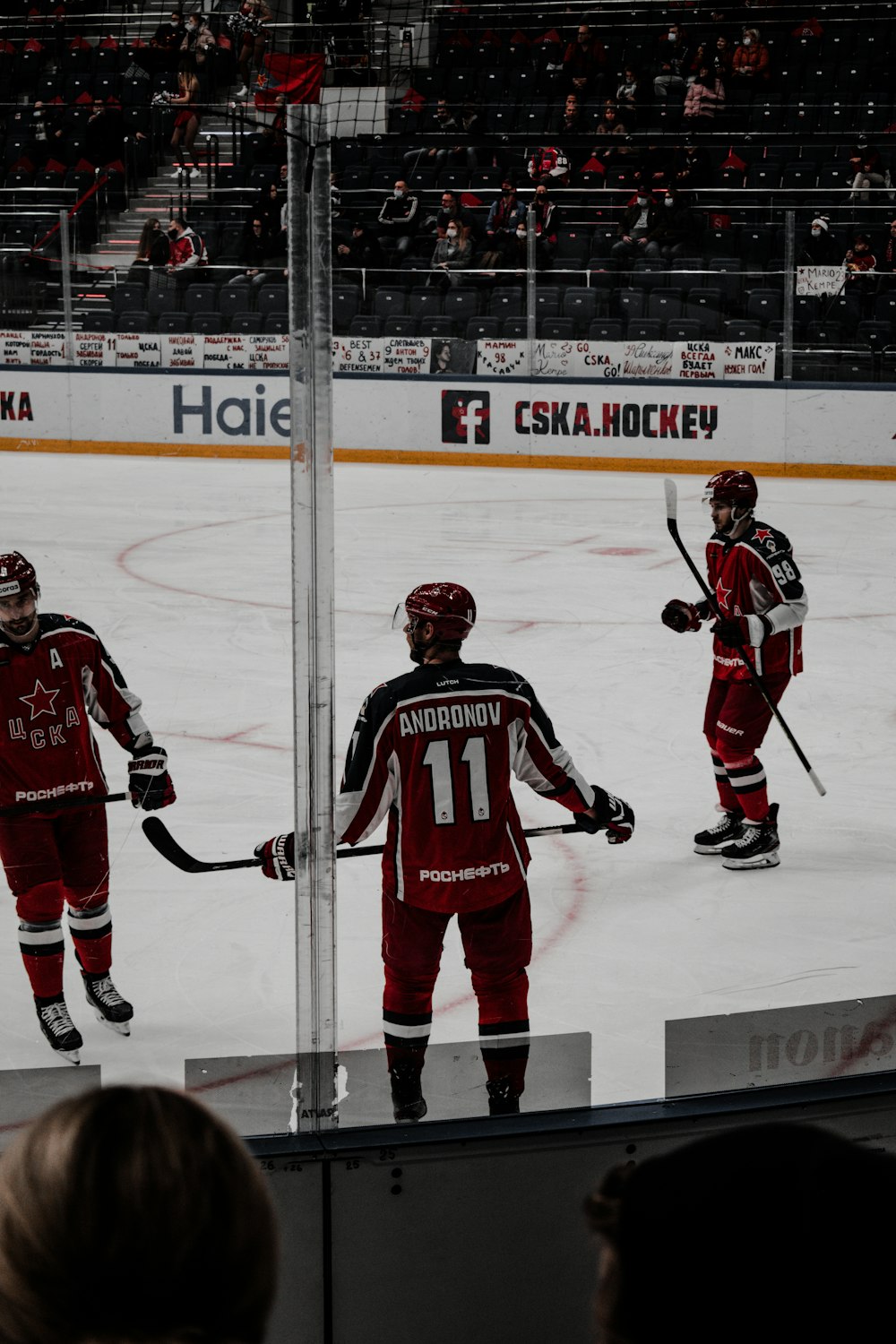 2 men playing ice hockey