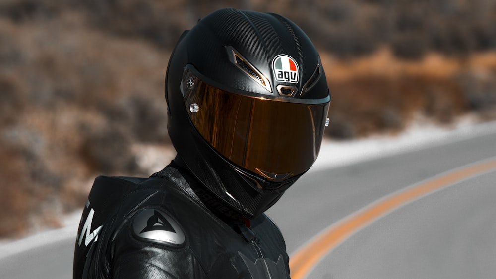 man in black helmet and black jacket