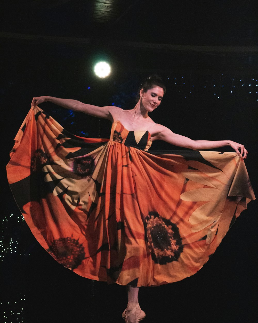 woman in red dress dancing