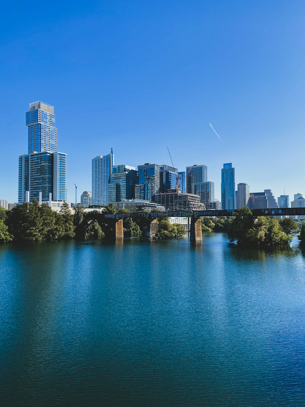 city skyline under blue sky during daytime