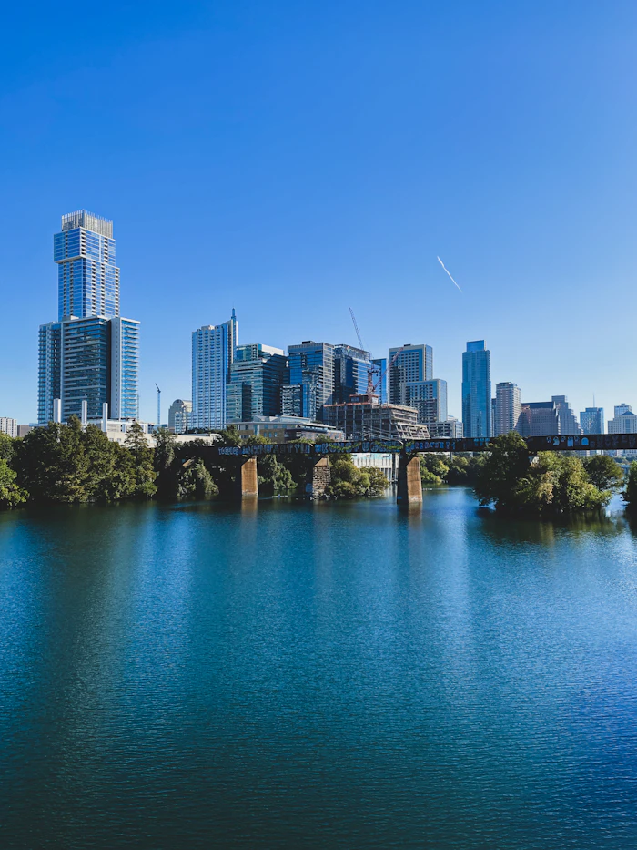 Austin Texas city skyline under blue sky