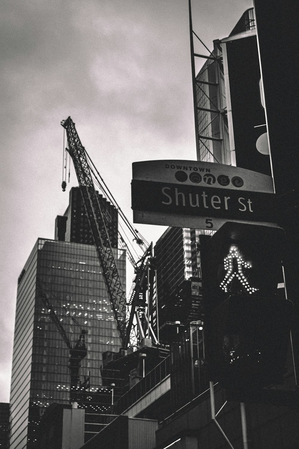 grayscale photo of city buildings