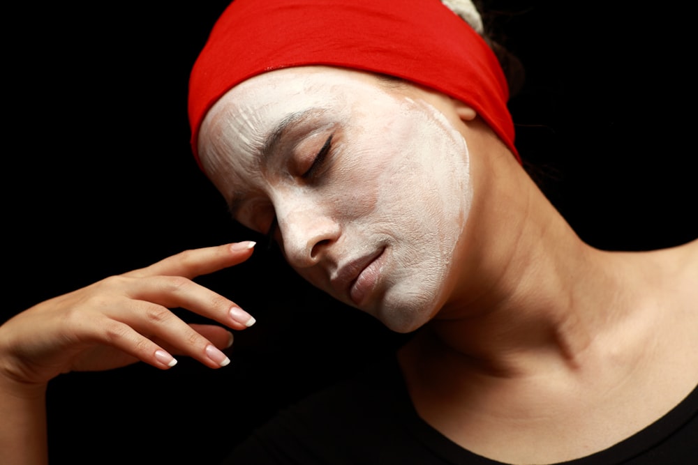 woman in red knit cap