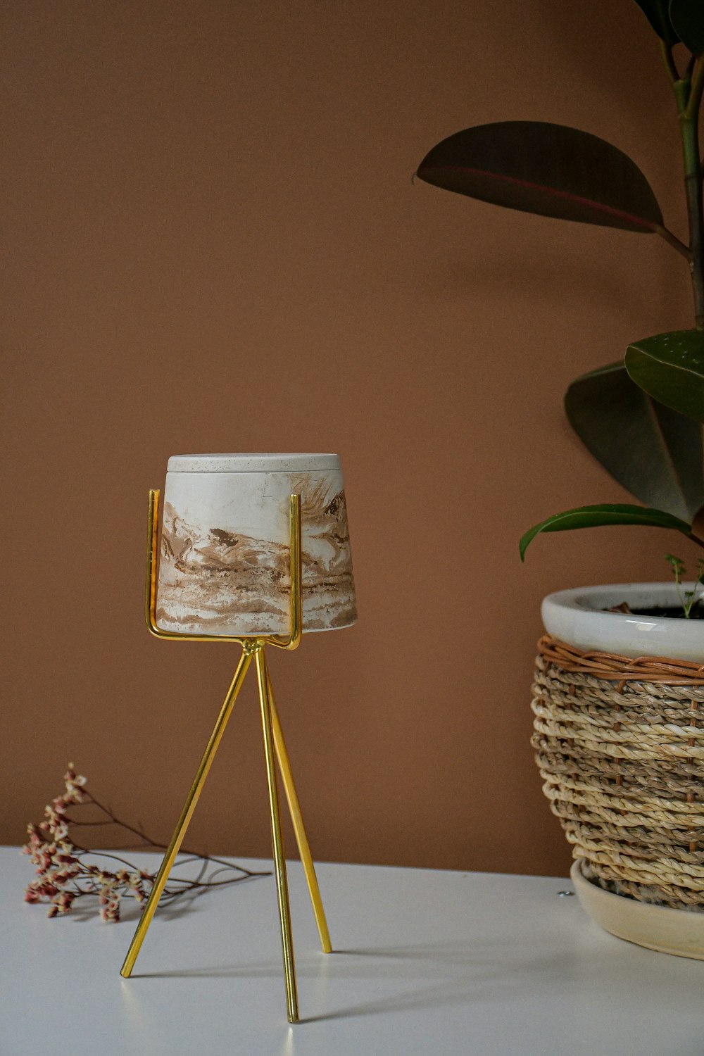 white and brown table lamp on brown wooden table