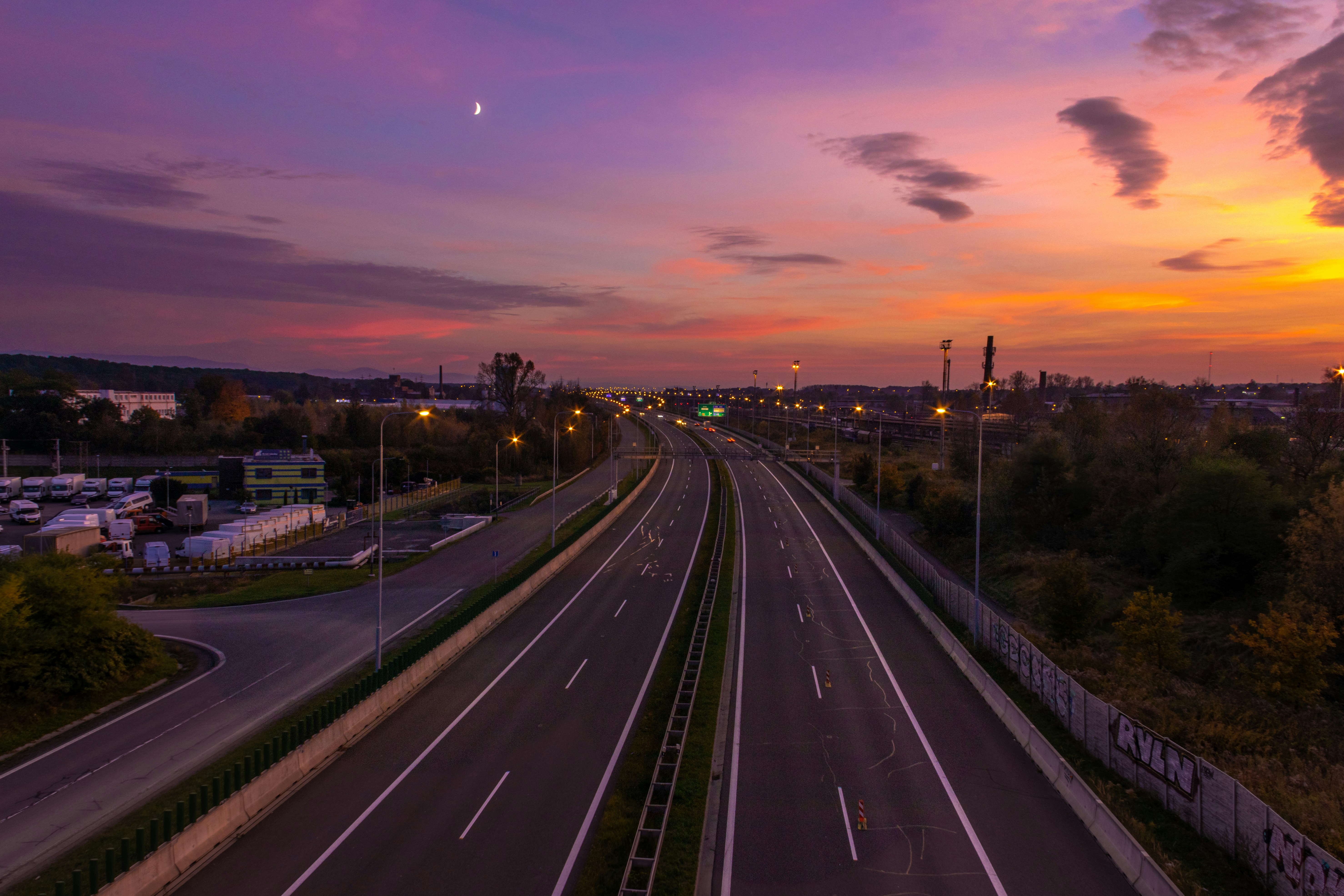 time lapse photography of cars on road during night time