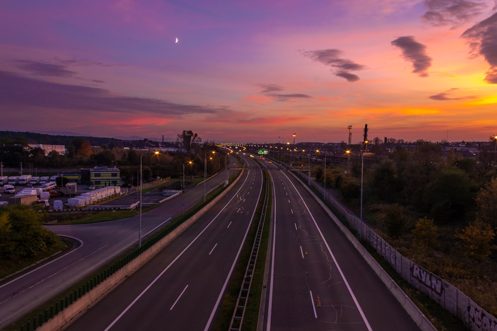 time lapse photography of cars on road during night time