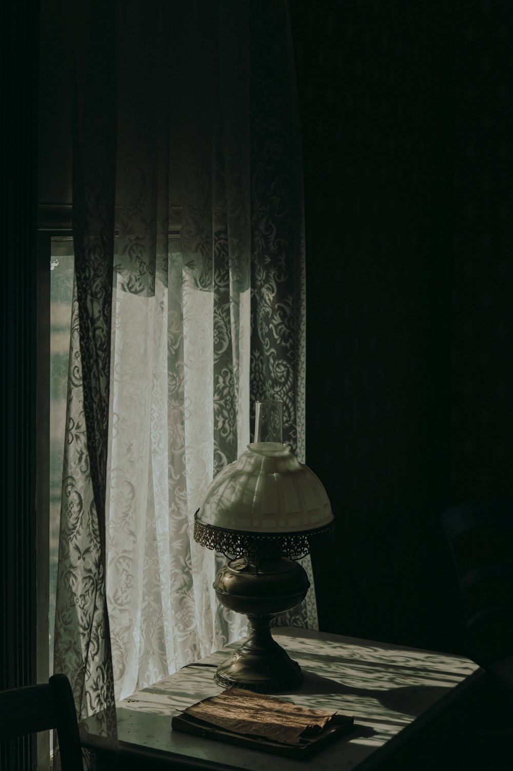 white and brown floral window curtain