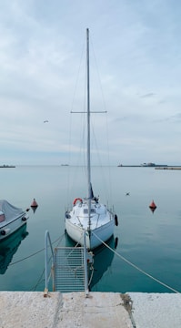 Boat moored at a harbor ready for departure.