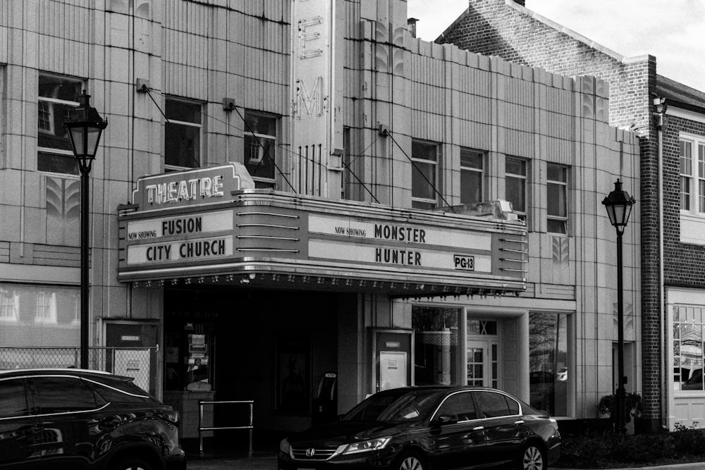 a black and white photo of a movie theater