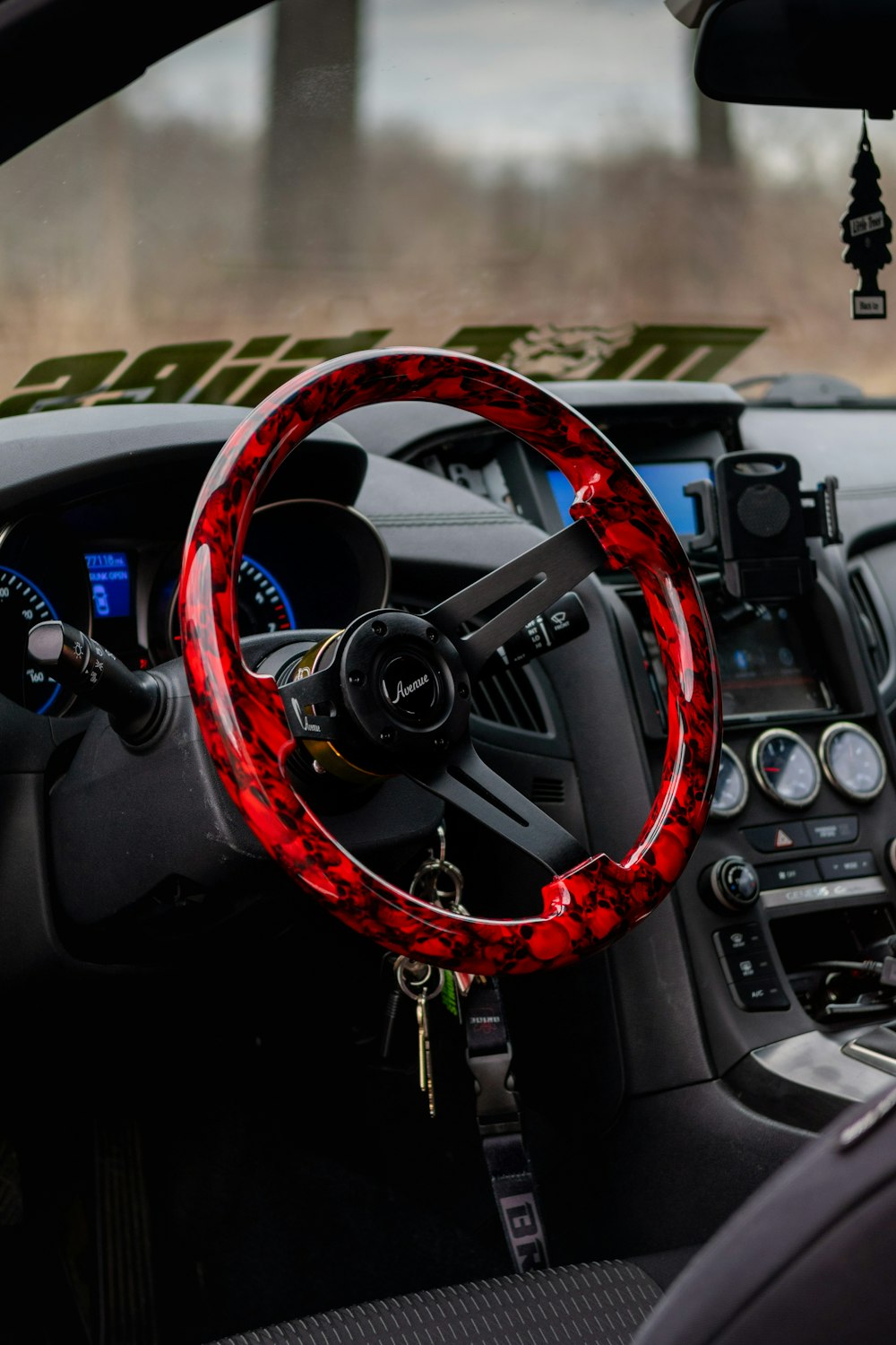 red and black steering wheel