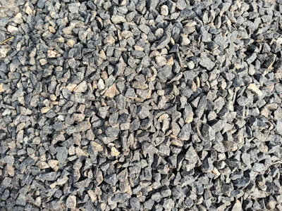 Close-up of crushed stone aggregates ready for construction use.