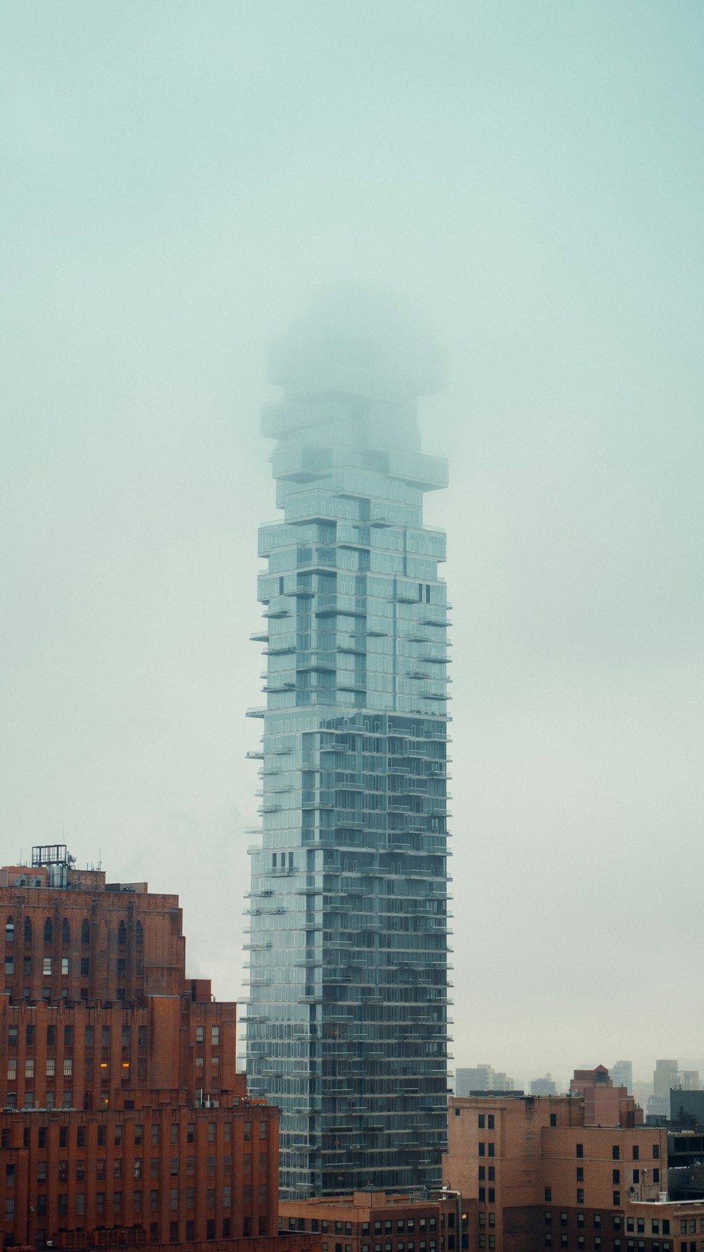 white concrete building under white sky during daytime