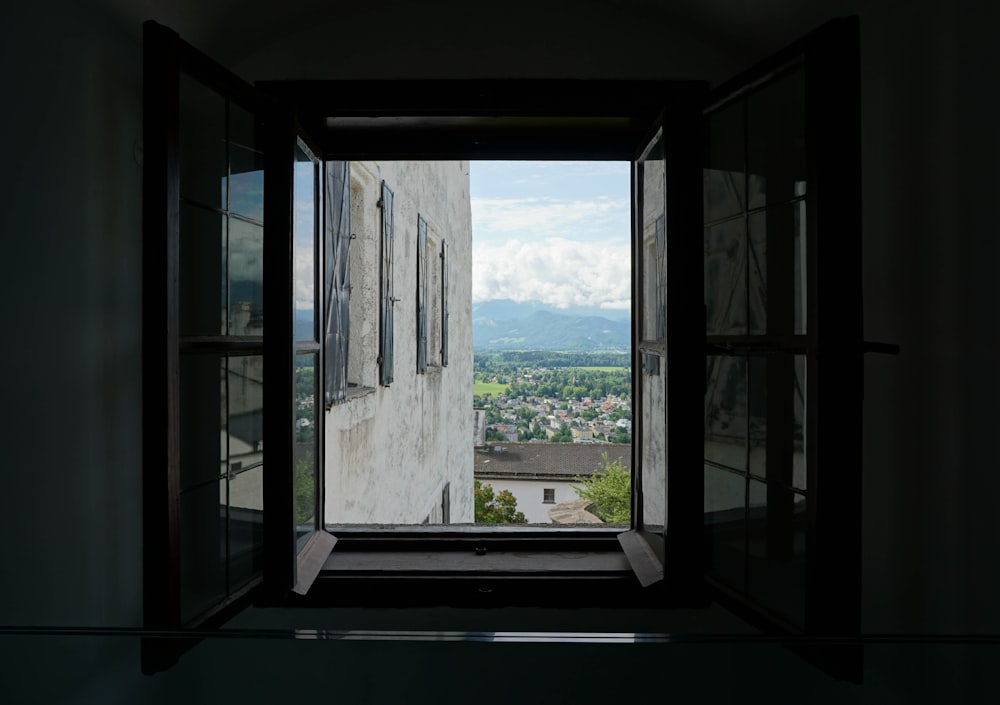 white wooden framed glass window