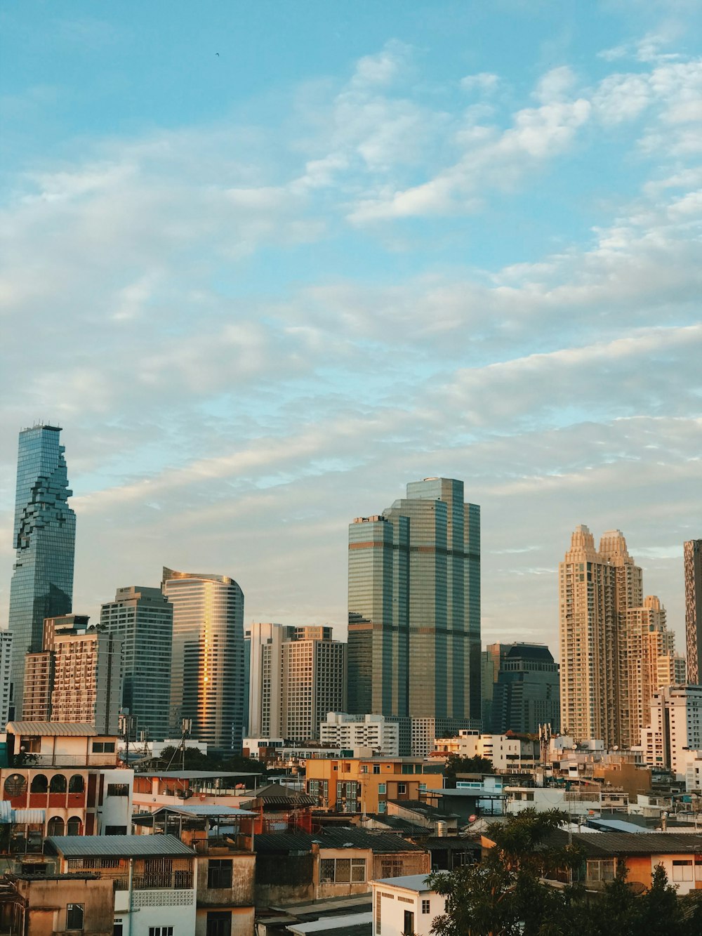 city skyline under blue sky during daytime