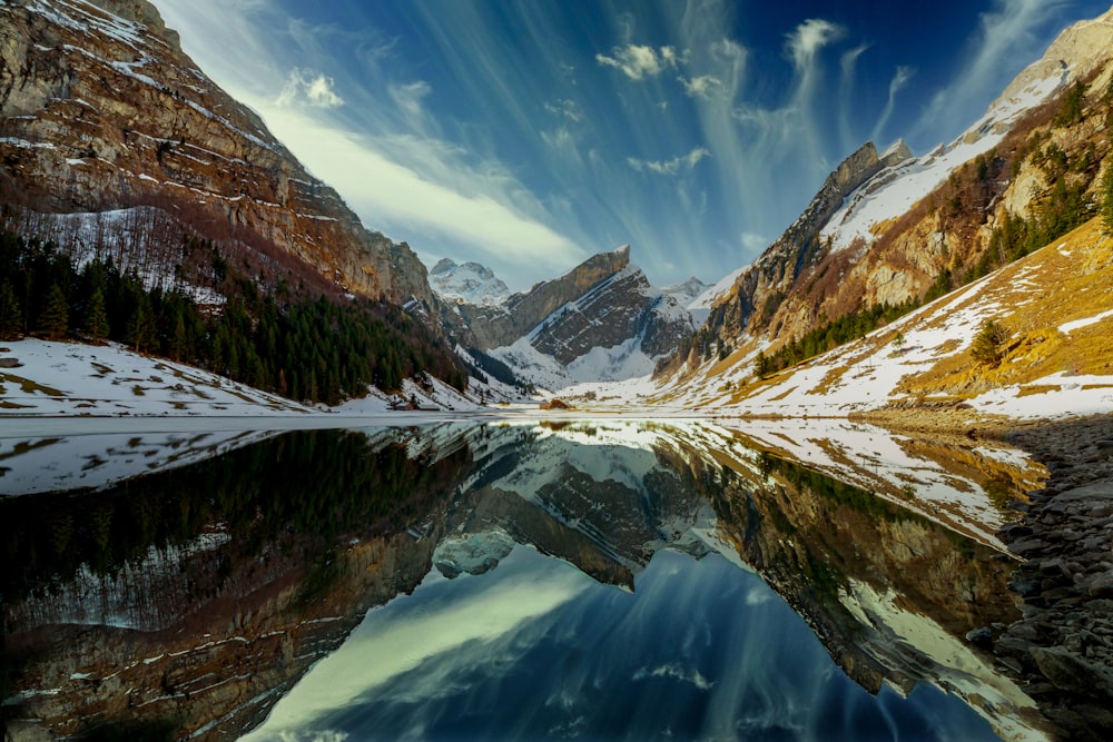 brown and green mountains under blue sky during daytime