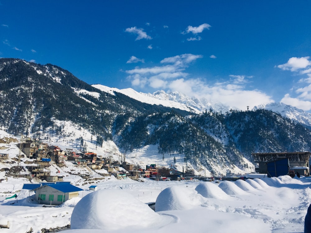 snow covered mountain under blue sky during daytime