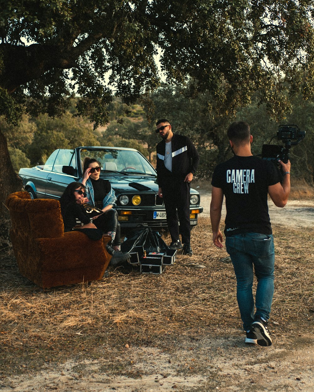 man in black crew neck t-shirt standing beside man in black crew neck t-shirt