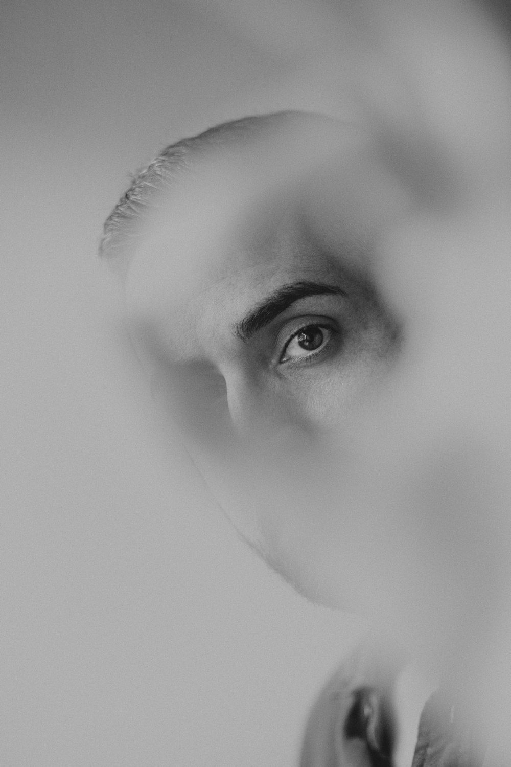 grayscale photo of womans face