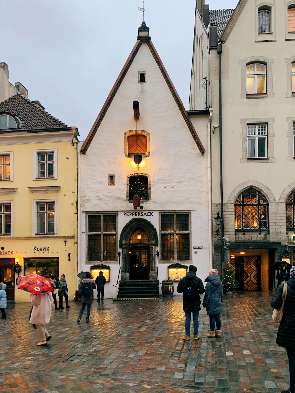 people walking on street near building during daytime