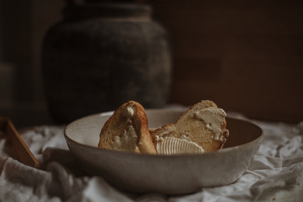 brown and white pastry on stainless steel round tray