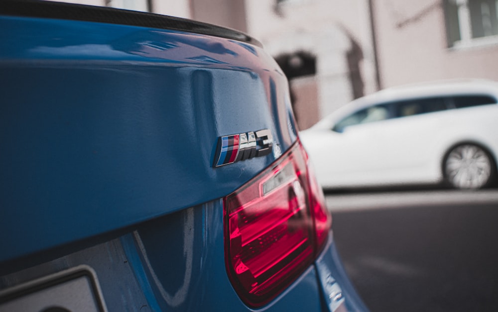 blue honda car on road during daytime