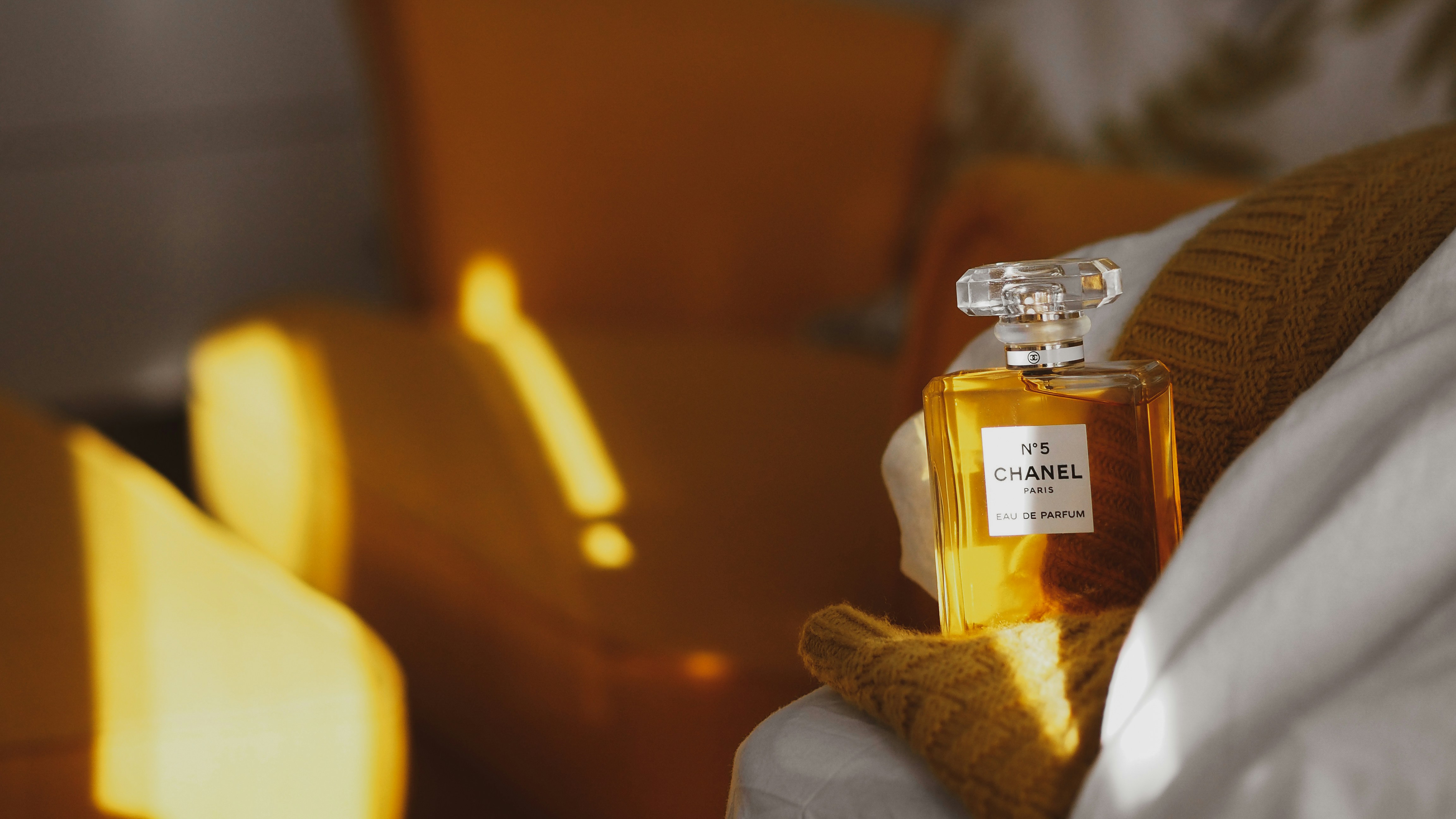 clear glass bottle with yellow liquid