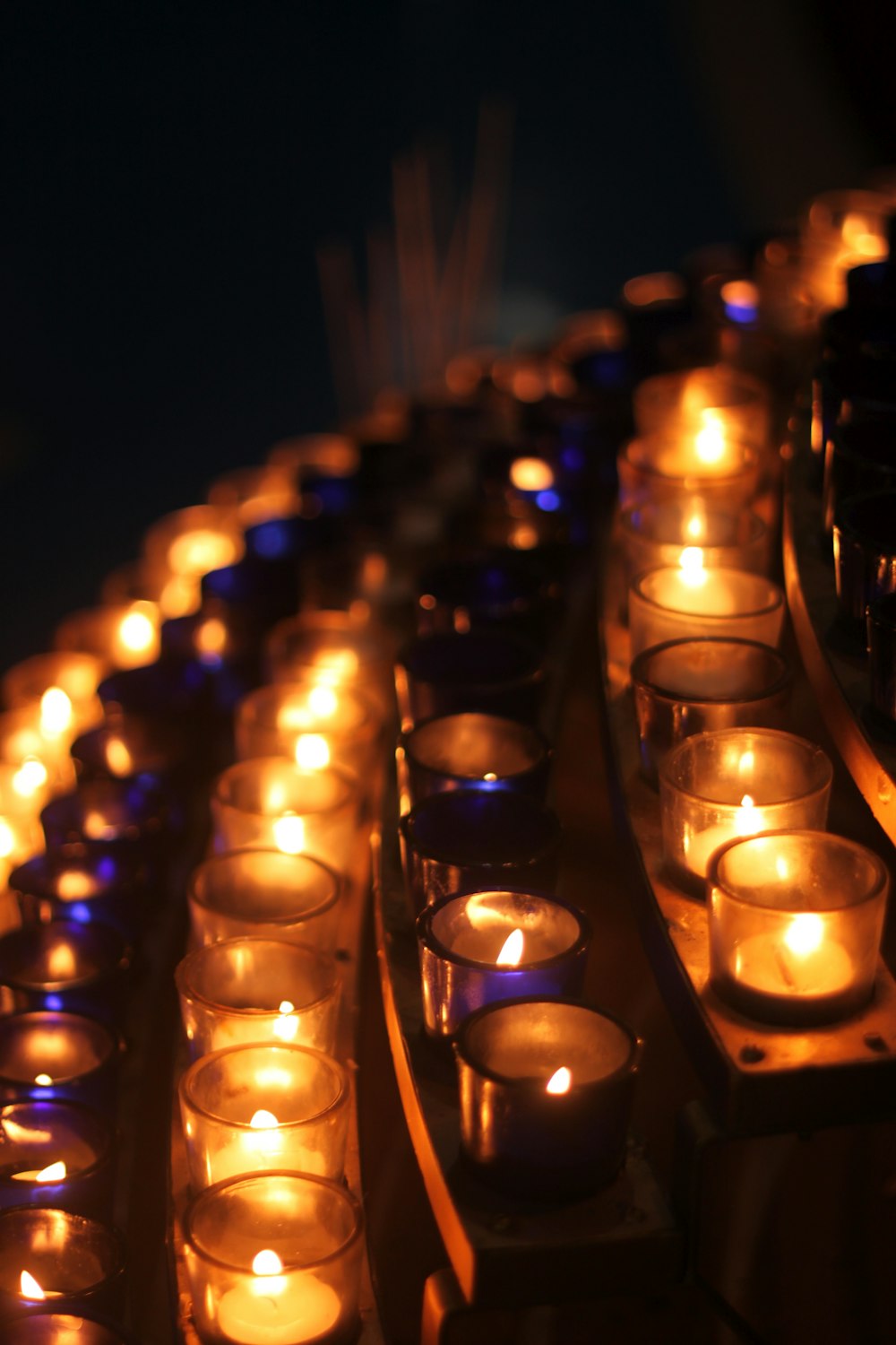 lighted candles on the holder