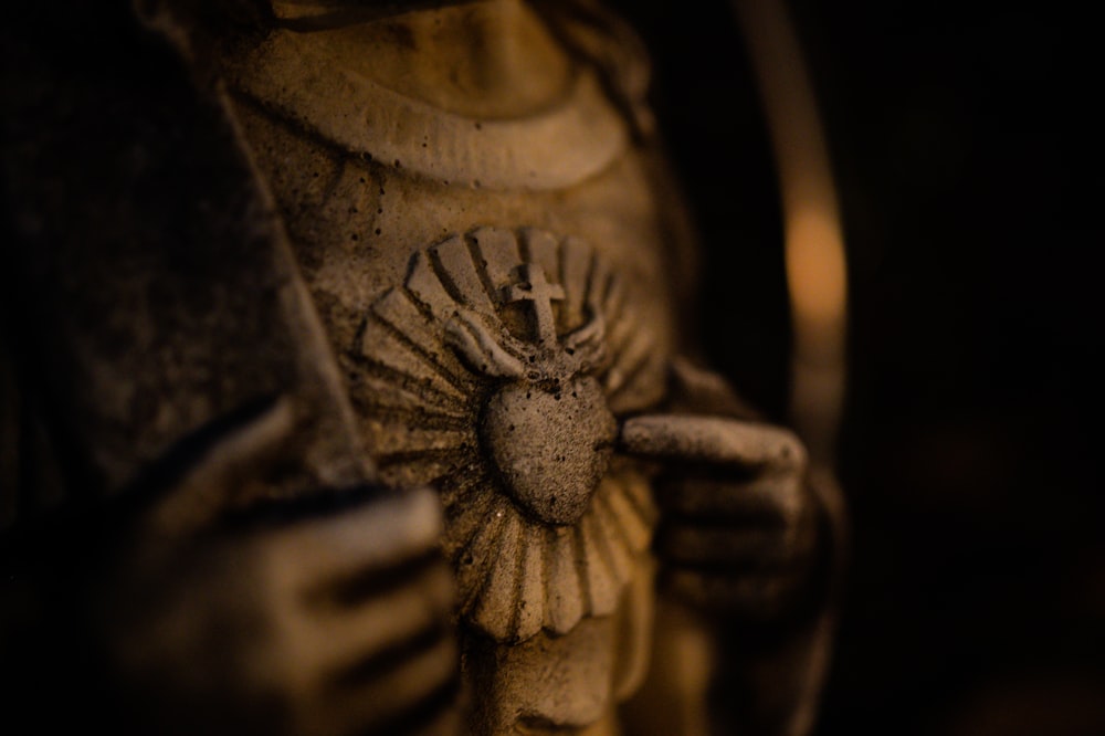 brown wooden carved flower ornament