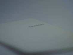 Trademark registration certificate displayed on a desk