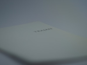 Trademark registration certificate displayed on a desk