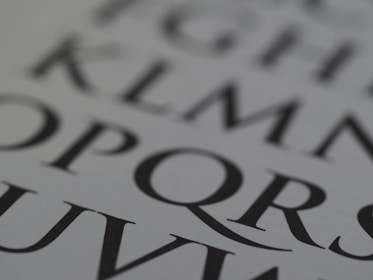 Close-up of bold typography on a black and white portfolio page.