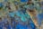 A close-up of a luxurious epoxy countertop with intricate patterns and vibrant colors.