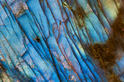Detailed view of the beryl emeralds sparkling vividly, emphasizing the unique texture from Serra da Carnaíba.