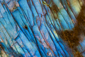 Deep blue cobalt mineral textures captured with sharp detail and subtle lighting contrasts