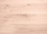 Elegant oak wood surface with visible knots and rich color