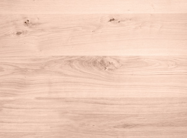 brown wooden surface with white and black textile