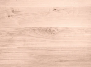 Elegant oak wood surface with visible knots and rich color