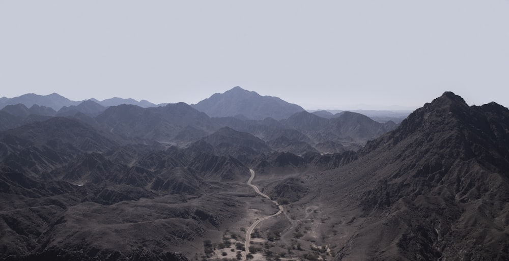 brown mountains under white sky during daytime